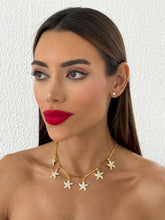 Carregar imagem no visualizador da galeria, https://febijus.bwimg.com.br/febijus/produtos/colar-folheado-a-ouro-18k-estrelas-do-mar-cravejadas-1767704500.9602.jpg