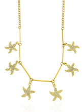 Carregar imagem no visualizador da galeria, https://febijus.bwimg.com.br/febijus/produtos/colar-folheado-a-ouro-18k-estrelas-do-mar-cravejadas-1767704501.0977.jpg