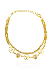 Carregar imagem no visualizador da galeria, https://febijus.bwimg.com.br/febijus/produtos/pulseira-folheada-a-ouro-18k-espirito-santo-com-coracao-cristal-1766774744.6959.jpg