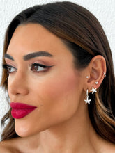 Carregar imagem no visualizador da galeria, https://febijus.bwimg.com.br/febijus/produtos/trio-de-brinco-folheado-a-ouro-18k-e-prata-design-estrela-do-mar-cravejado-1766779997.7595.jpg