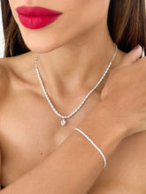 Carregar imagem no visualizador da galeria, https://febijus.bwimg.com.br/febijus/produtos/conjunto-colar-e-pulseira-folheado-a-prata-925-cordao-baiano-com-coracao-de-cristal-1764247181.4917.jpg
