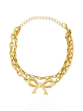 Carregar imagem no visualizador da galeria, https://febijus.bwimg.com.br/febijus/produtos/pulseira-dupla-folheada-a-ouro-18k-elos-ovais-e-quadrados-com-pingente-de-laco-1766773665.363.jpg
