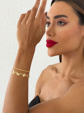 Carregar imagem no visualizador da galeria, https://febijus.bwimg.com.br/febijus/produtos/pulseira-dupla-folheada-a-ouro-18k-estrelas-lisas-1766773349.1547.jpg
