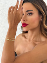 Carregar imagem no visualizador da galeria, https://febijus.bwimg.com.br/febijus/produtos/pulseira-folheada-a-ouro-18k-espirito-santo-com-coracao-cristal-1766774744.5116.jpg
