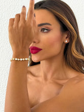 Carregar imagem no visualizador da galeria, https://febijus.bwimg.com.br/febijus/produtos/pulseira-folheado-a-ouro-18k-e-prata-coracao-de-cristal-e-cravejada-1766771071.2697.jpg
