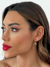 Carregar imagem no visualizador da galeria, https://febijus.bwimg.com.br/febijus/produtos/trio-de-brinco-folheado-a-ouro-18k-e-prata-ponto-de-luz-estrela-do-mar-e-peixe-1767617961.5948.jpg
